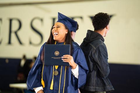 Howard graduate receiving diploma